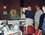Gerry Anderson commenting items on display